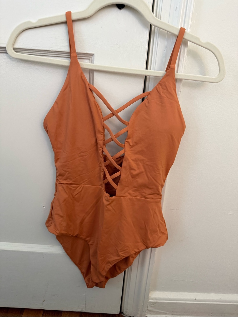 Dippin’ Daisy’s one piece plunge suit in XS. NEVER WORN!